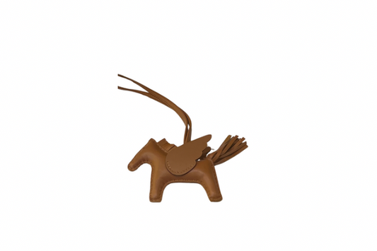 Hermes Rodeo Charm PM Gold