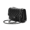 Мини-сумка Chanel из черной икорной кожи